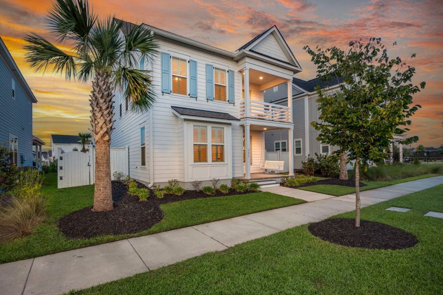Front exterior of a new home in Nexton, Summerville, SC, highlighting curb appeal (Image 26). Front exterior of a new home in Nexton, Summerville, SC, highlighting curb appeal (Image 26).