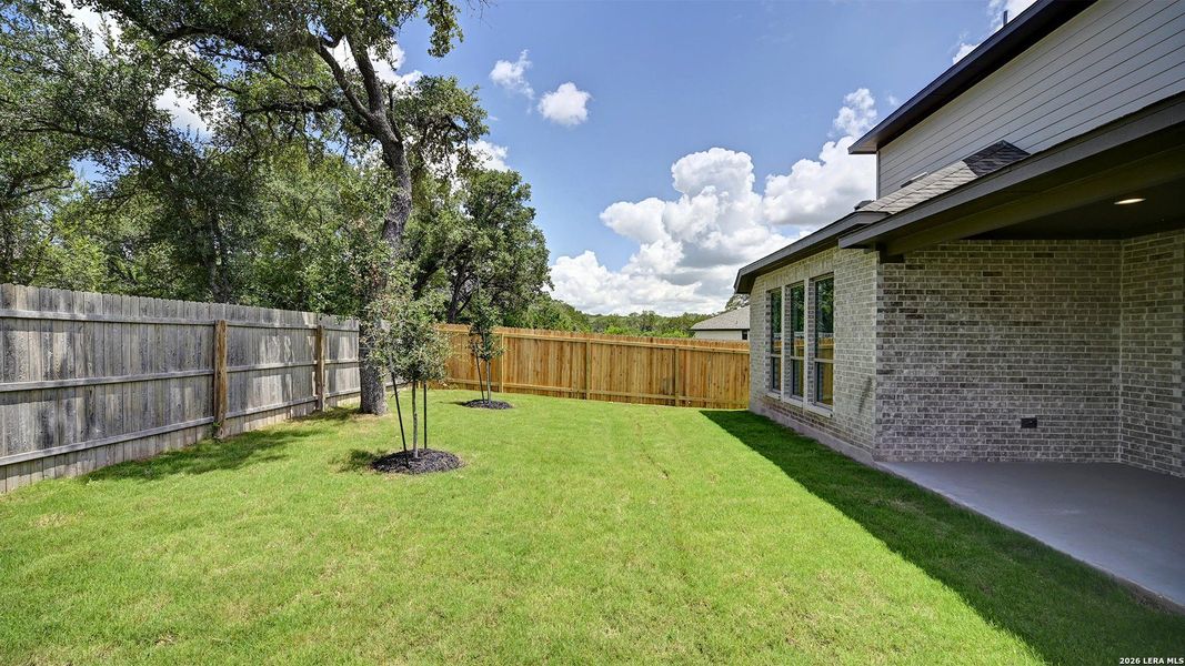 Exterior details and patio area of a home in Kallison Ranch, San Antonio (Image 3).