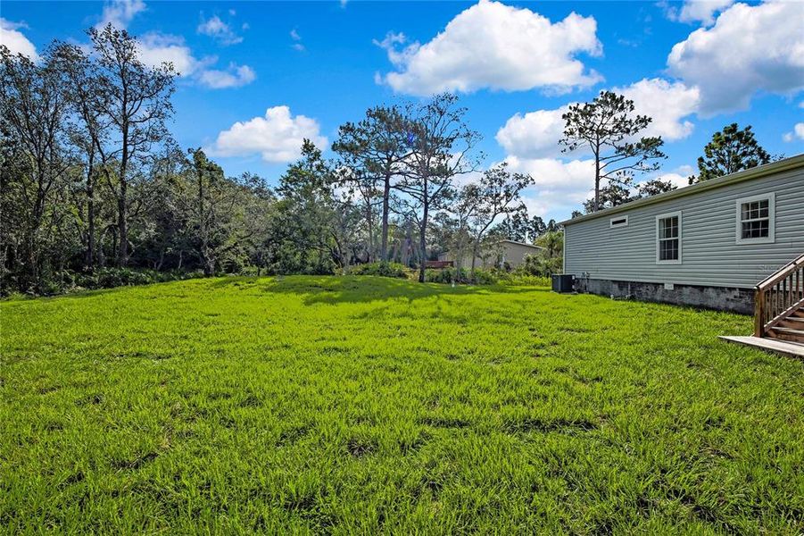 Front exterior of a new home in , Homosassa, FL, highlighting curb appeal (Image 24).