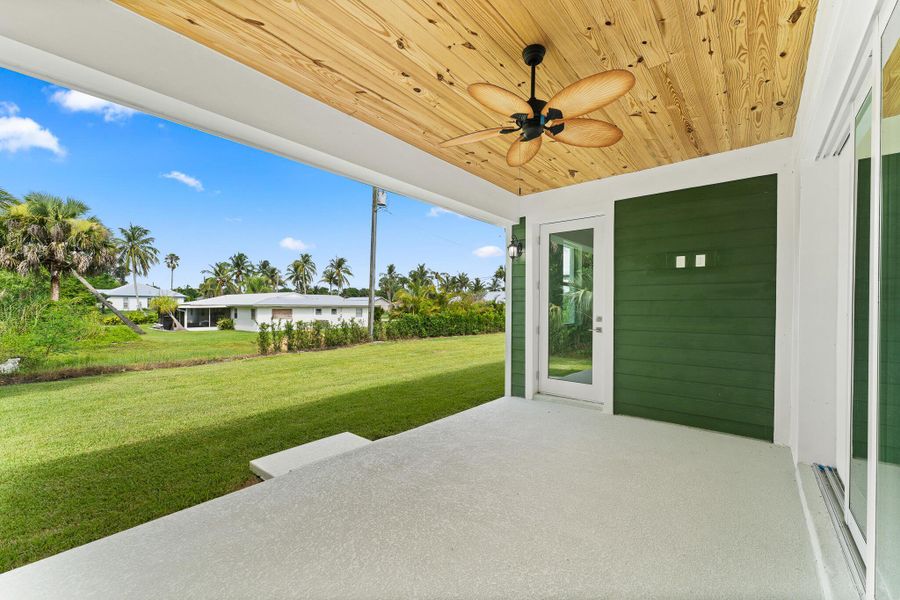 Front exterior of a new home in , Stuart, FL, highlighting curb appeal (Image 23). Front exterior of a new home in , Stuart, FL, highlighting curb appeal (Image 23).