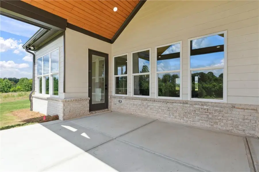 Front exterior of a new home in , Jefferson, GA, highlighting curb appeal (Image 1).