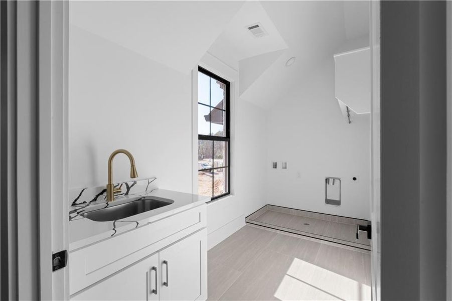 Furnished interior view inside a new home in , Suwanee (Image 18).