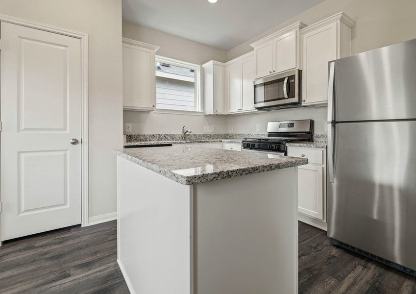 Chef-ready kitchen with a island overlooking the dining room Chef-ready kitchen with a island overlooking the dining room