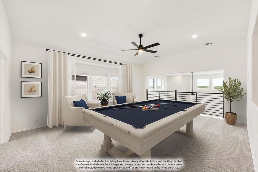 Upstairs game room with pool table, ceiling fan, carpet flooring, and open railing overlooking lower level