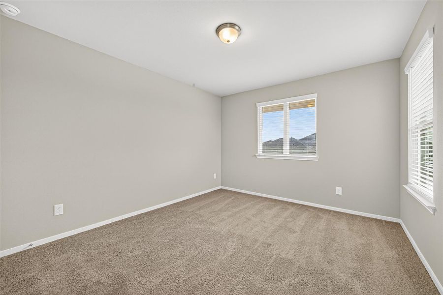 Spacious, unfurnished interior of a new home in Sunterra, Katy (Image 20).