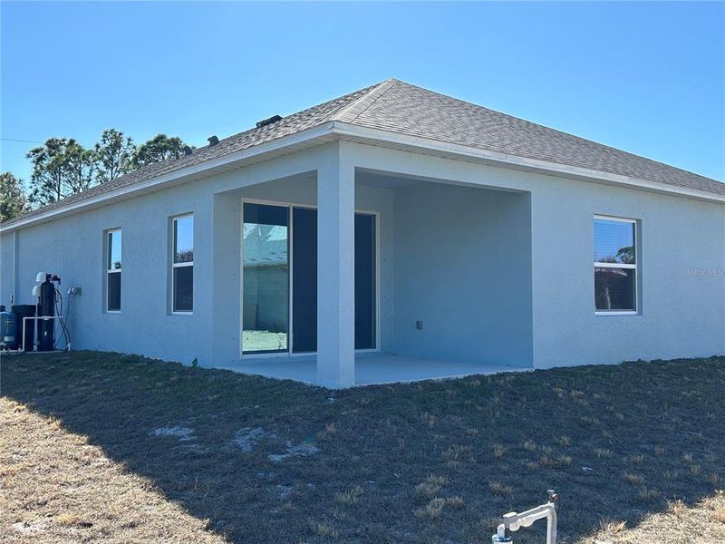 Exterior details and patio area of a home in Port Charlotte, Port Charlotte (Image 3).