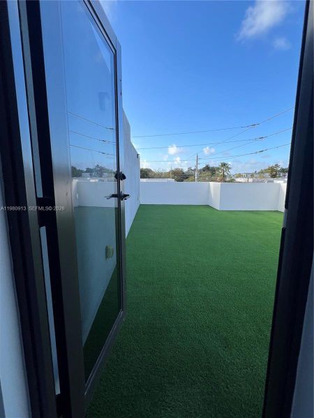 Exterior details and patio area of a home in , Miami (Image 15). Exterior details and patio area of a home in , Miami (Image 15).