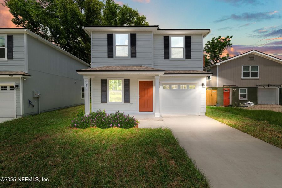 Front exterior of a new home in , Jacksonville, FL, highlighting curb appeal (Image 14).