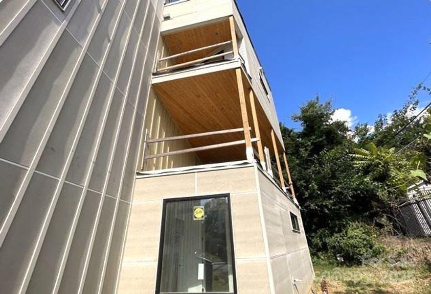 Exterior details and patio area of a home in , Charlotte (Image 2). Exterior details and patio area of a home in , Charlotte (Image 2).