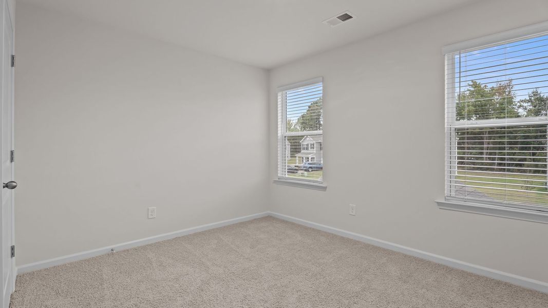 Spacious, unfurnished interior of a new home in Hobbs Farm, Ayden (Image 21).