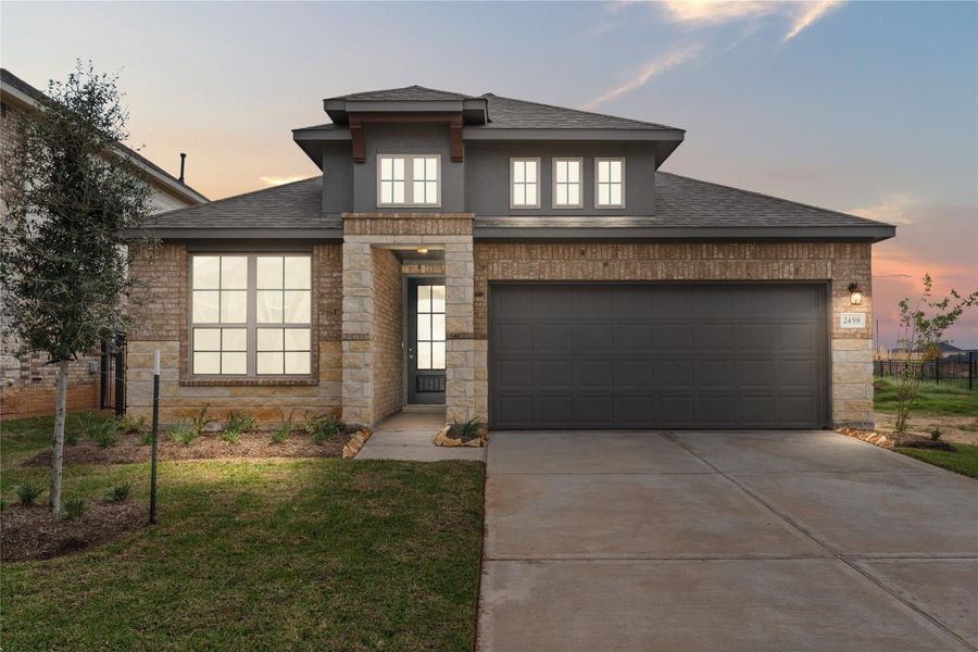 Welcome home to 2459 Solaris Bend Drive located in the master planned community of Sunterra and zoned to Katy ISD.