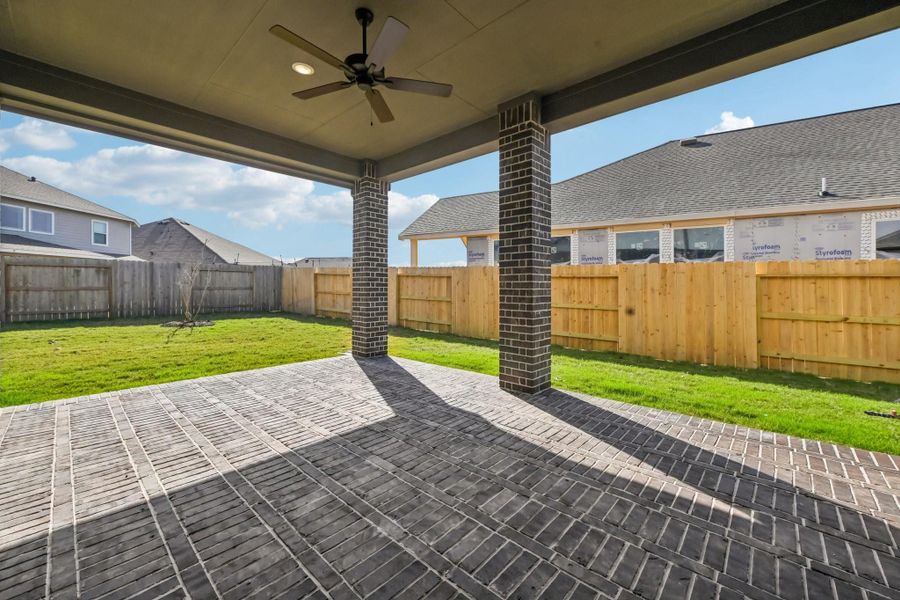 Exterior details and patio area of a home in Artavia, Conroe (Image 3).
