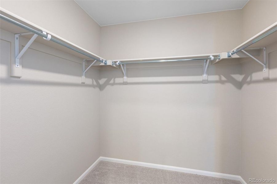 Spacious, unfurnished interior of a new home in The Cottages Collection at Ridgeline Vista, Brighton (Image 21).