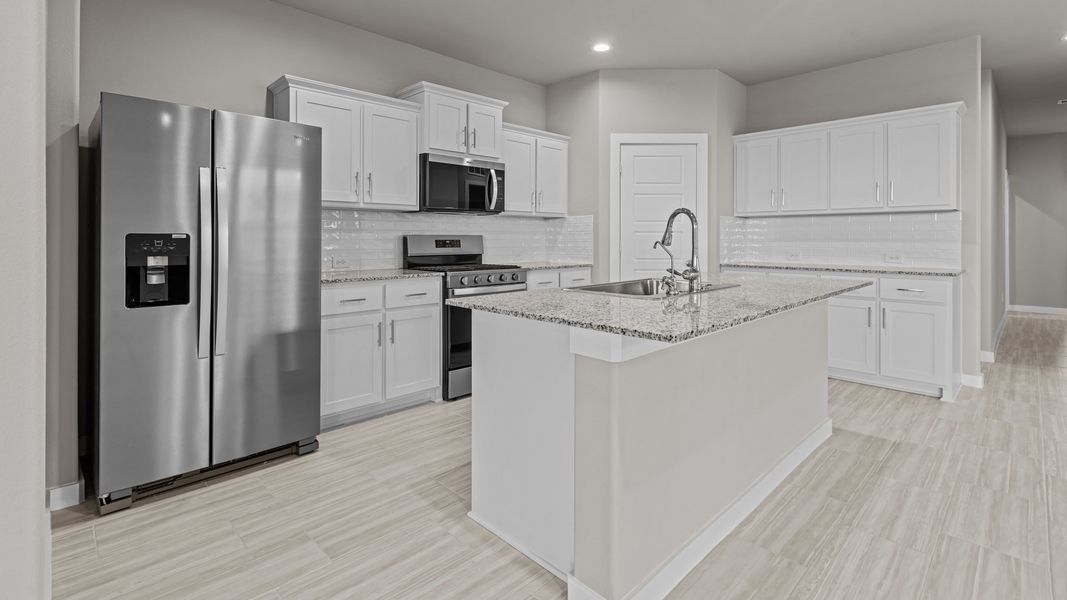 Representative furnished interior of a home built from the Jaxson by D.R. Horton in Legacy South, Midland (Image 7).