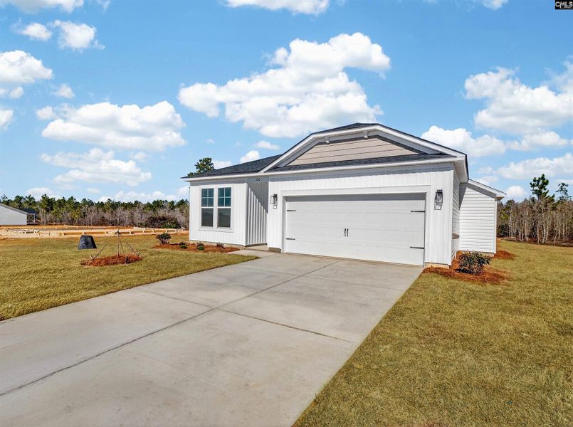 Front exterior of a new home in Old Charleston Acres, Pelion, SC, highlighting curb appeal (Image 20).