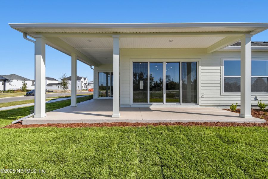 Exterior details and patio area of a home in Seven Pines 50' Front Entry, Jacksonville (Image 3).