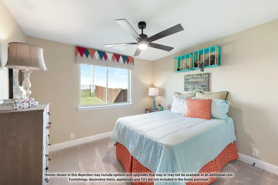 Children's bedroom with ceiling fan, full bed, dresser, and wall shelf with toys Children's bedroom with ceiling fan, full bed, dresser, and wall shelf with toys