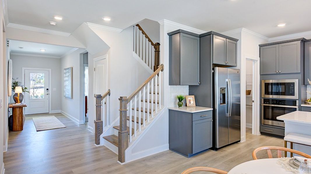Representative furnished interior of a home built from the Ashford by Taylor Morrison in Hidden Creek, Cary (Image 27).