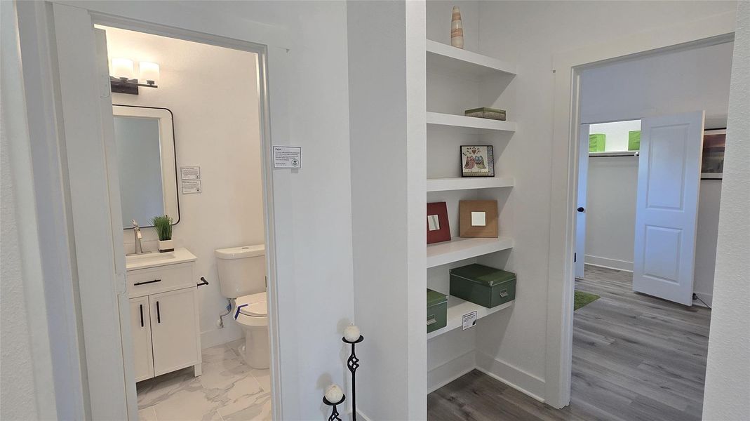 Thoughtfully designed built-in shelving in the hallways and living areas.