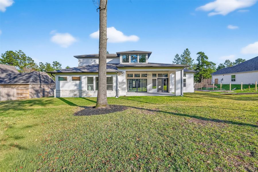 Exterior details and patio area of a home in Stewart’s Forest, Conroe (Image 28). Exterior details and patio area of a home in Stewart’s Forest, Conroe (Image 28).