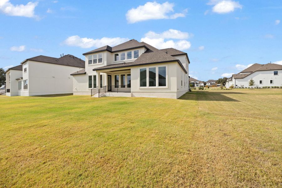 Exterior details and patio area of a home in , Leander (Image 24).