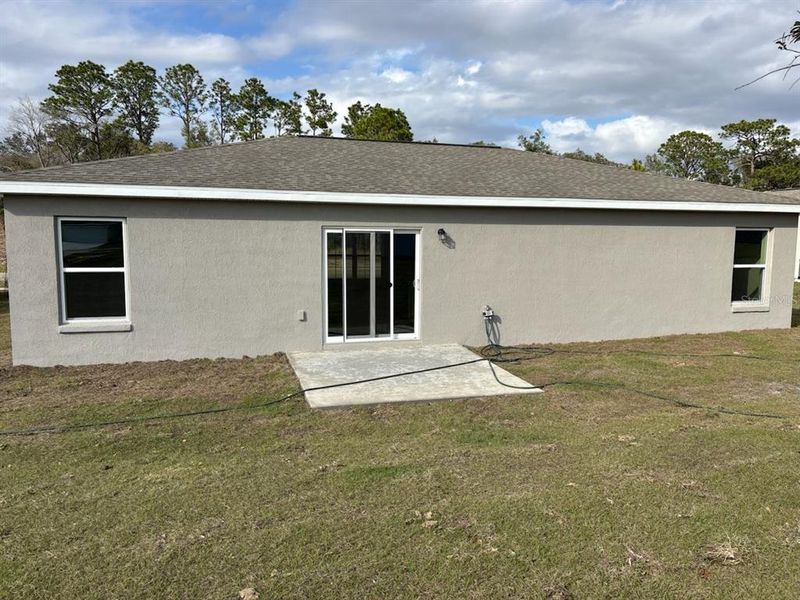 Exterior details and patio area of a home in , Citrus Springs (Image 17).