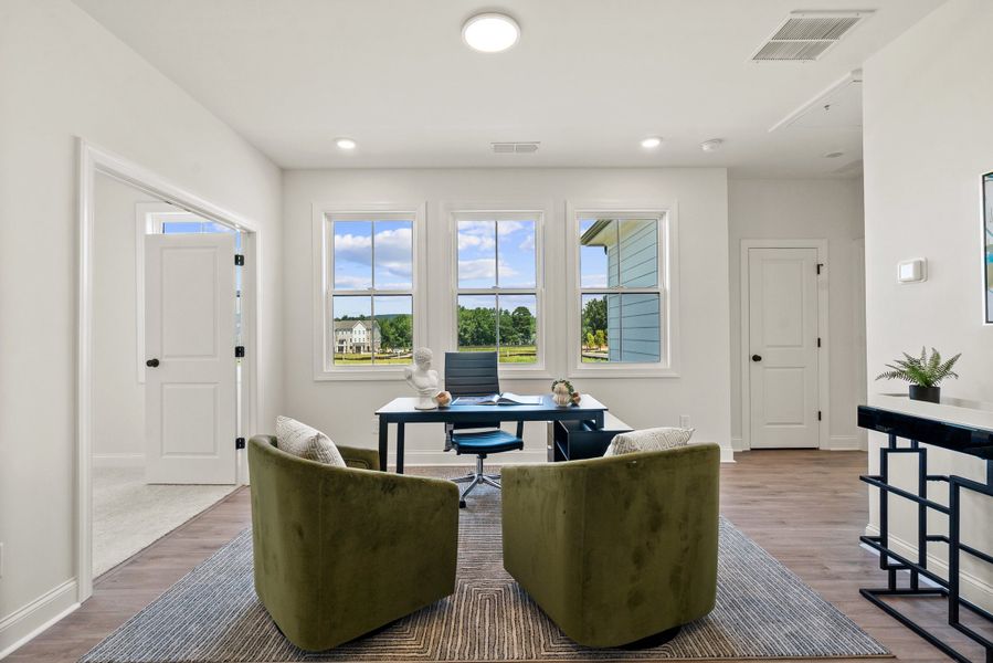 Representative furnished interior of a home built from the The Kenton by The Providence Group in Promenade at Sawnee Village, Cumming (Image 35).