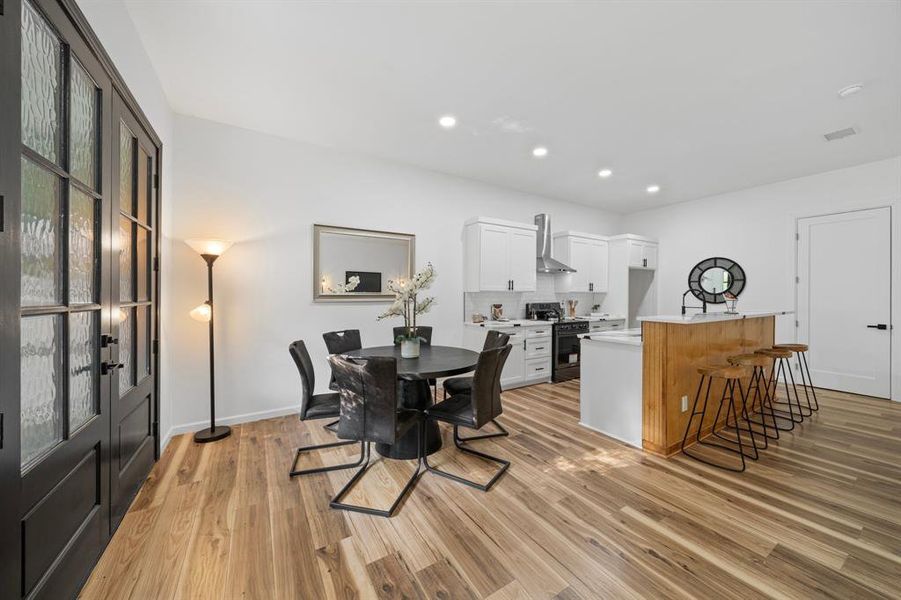 Dining room with light wood-type flooring