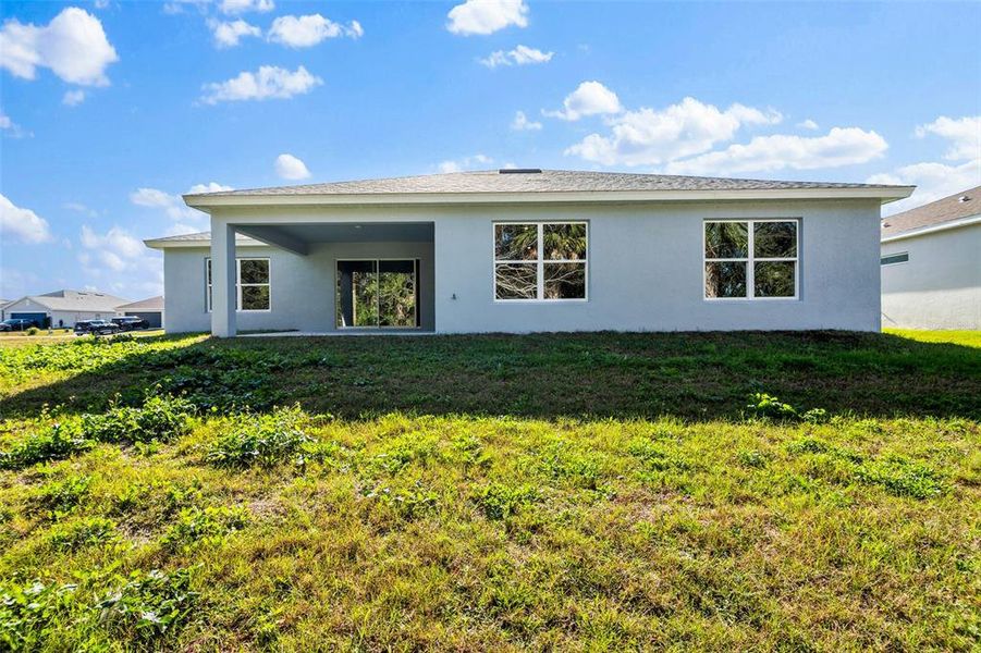 Exterior details and patio area of a home in , Ocala (Image 25).