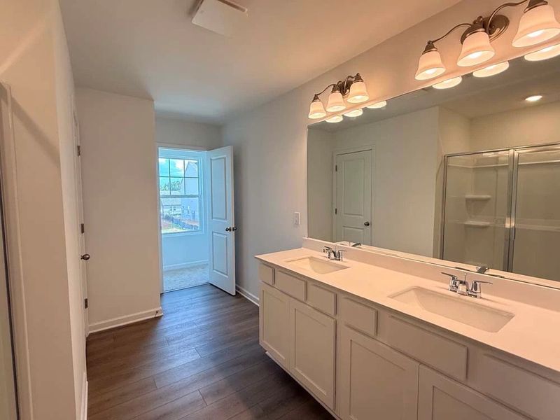 Primary Bathroom featuring Timeless Collection Finishes