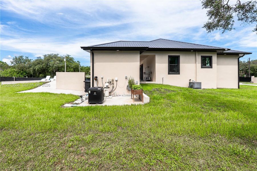 Exterior details and patio area of a home in , Clewiston (Image 25).