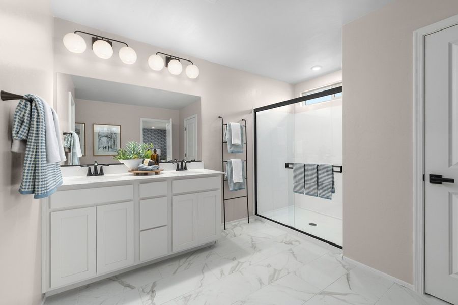 Dual-sink vanity at primary bath