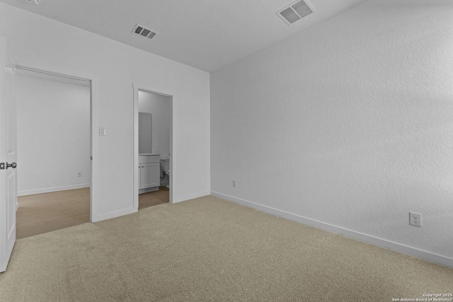 Spacious, unfurnished interior of a new home in Waterwheel: Coastline Collection, San Antonio (Image 19).