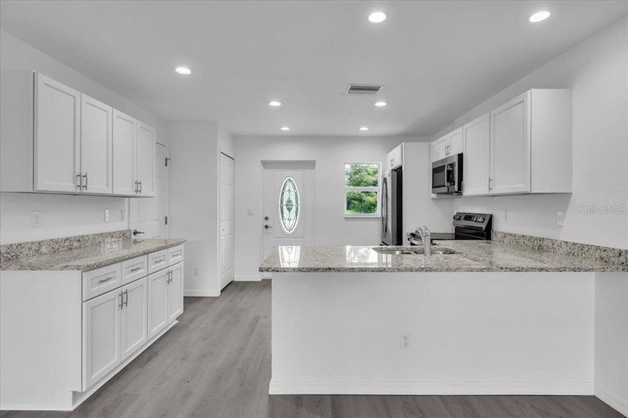 Furnished interior view inside a new home in , Punta Gorda (Image 7).