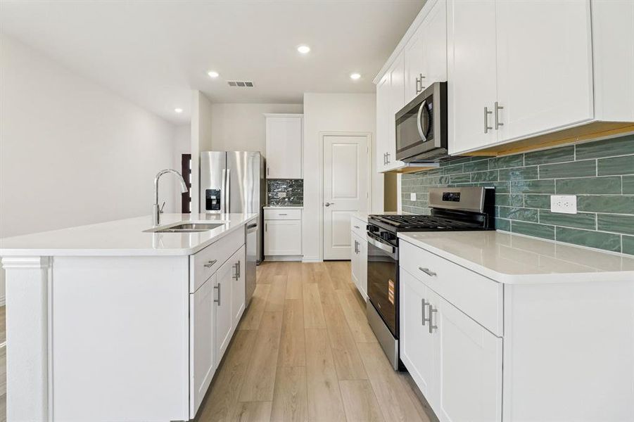 Furnished interior view inside a new home in Lakehaven - Spring Series, Farmersville (Image 10).
