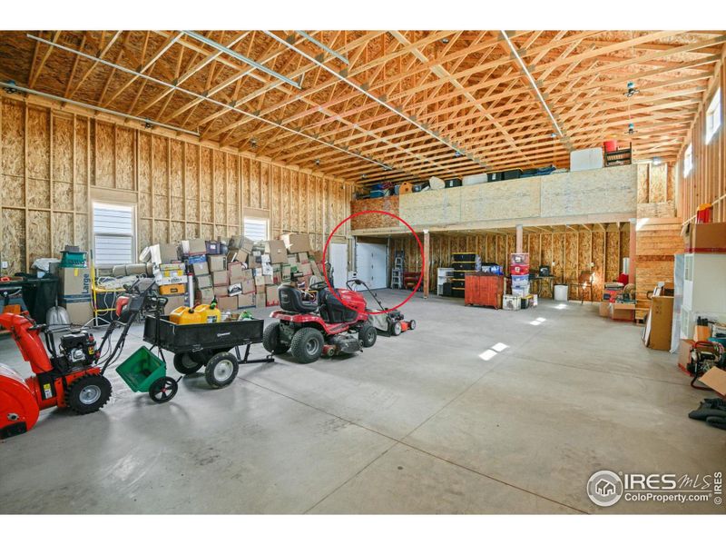 Rear side garage door for greater access