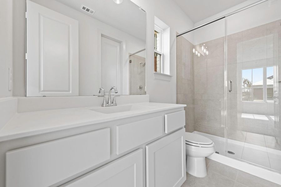 Furnished interior view inside a new home in Bridgeland, Cypress (Image 11).