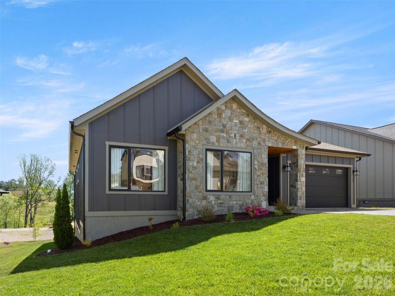 Front exterior of a new home in , Arden, NC, highlighting curb appeal (Image 20). Front exterior of a new home in , Arden, NC, highlighting curb appeal (Image 20).