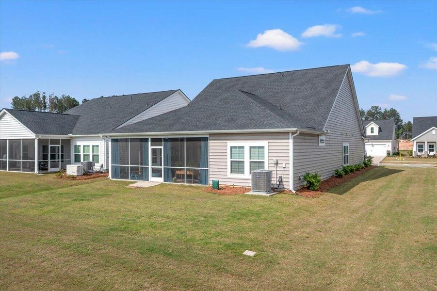 Exterior details and patio area of a home in Horizons at Summers Corner | 55+, Summerville (Image 28).