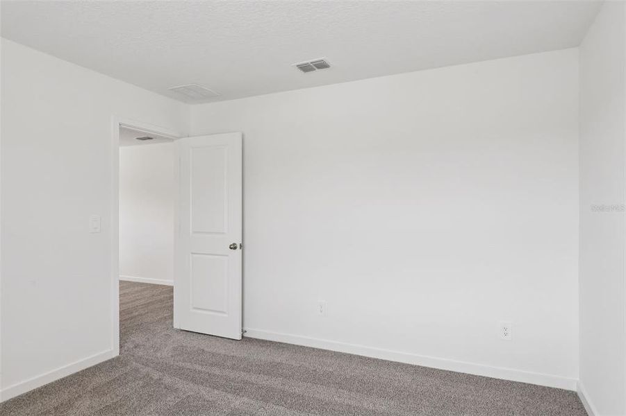 Spacious, unfurnished interior of a new home in Flagler Village - Classic Series, Palm Coast (Image 16). Spacious, unfurnished interior of a new home in Flagler Village - Classic Series, Palm Coast (Image 16).