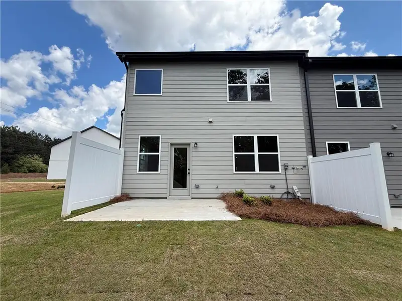 Exterior details and patio area of a home in The Towns at Auburn Station East, Auburn (Image 3).