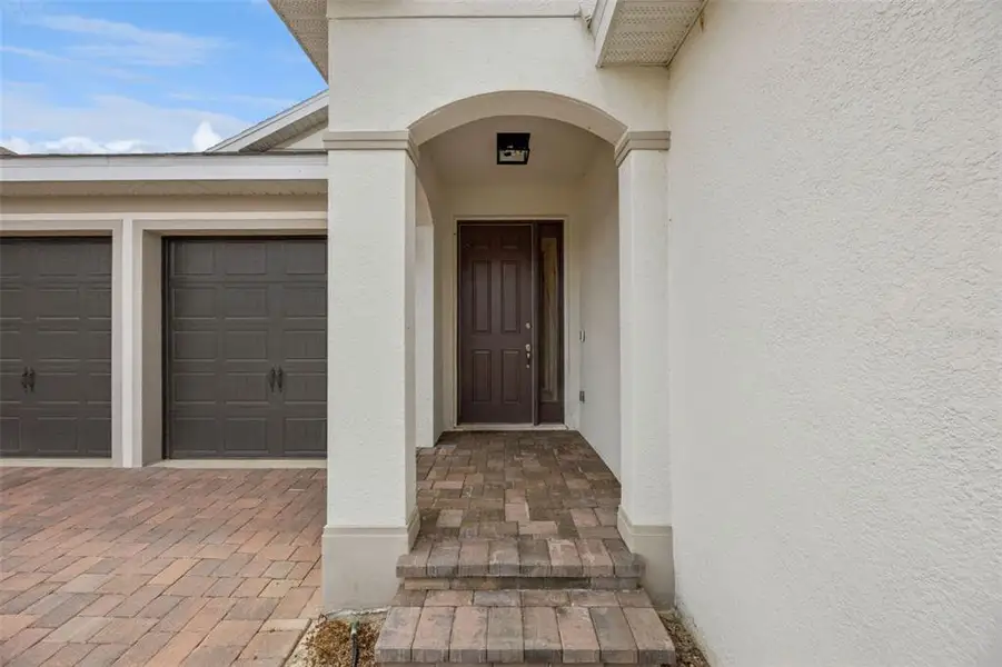 Exterior details and patio area of a home in , Minneola (Image 26).