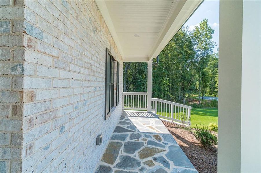 Exterior details and patio area of a home in , Loganville (Image 30).