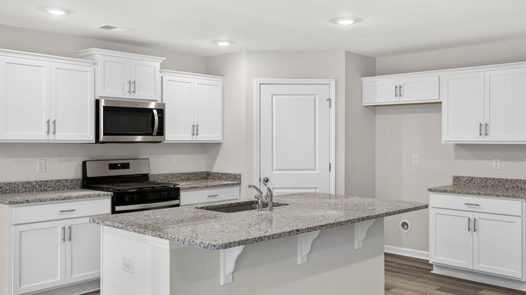 Furnished interior view inside a new home in Harrier Point, Woodruff (Image 7).