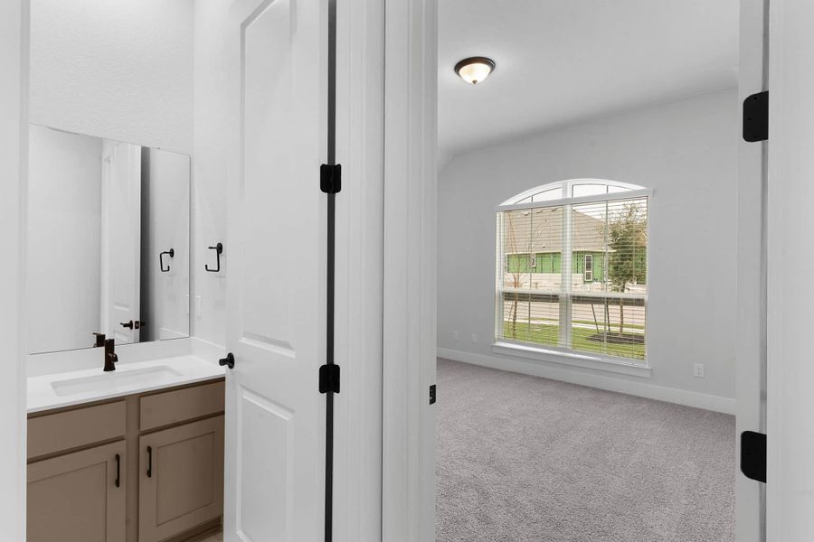 Furnished interior view inside a new home in The Grove at Blackhawk, Pflugerville (Image 17).