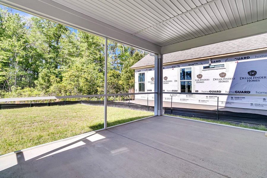 Front exterior of a new home in Tidewater at Lakes of Cane Bay, Summerville, SC, highlighting curb appeal (Image 17). Front exterior of a new home in Tidewater at Lakes of Cane Bay, Summerville, SC, highlighting curb appeal (Image 17).