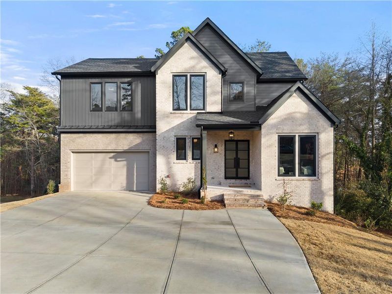 Front exterior of a new home in , Cumming, GA, highlighting curb appeal (Image 28).
