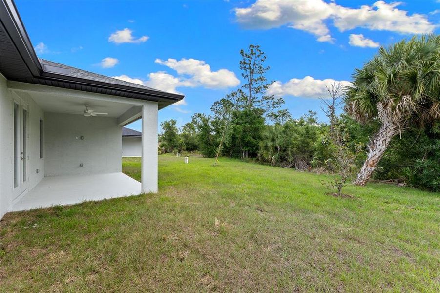 Exterior details and patio area of a home in , North Port (Image 18).