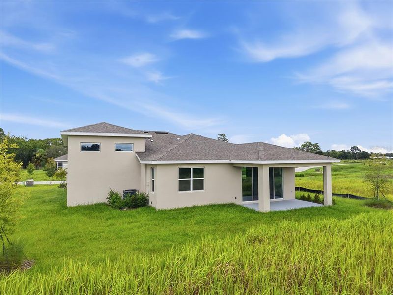 Exterior details and patio area of a home in Glen Lakes, Weeki Wachee (Image 18). Exterior details and patio area of a home in Glen Lakes, Weeki Wachee (Image 18).
