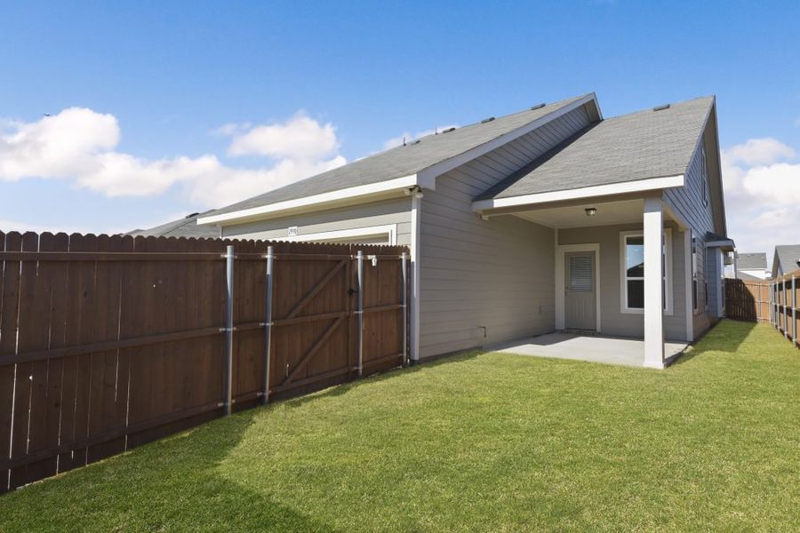 Representative exterior photo of a completed home built from the Cameron by Impression Homes in Heartland, Heartland, TX (Image 22).